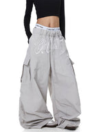 Whysoil-Cursive Front Letter Dual Pocket Drawstring Ultra Wide Leg Cargo Pants